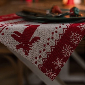 Christmas reindeer jacquard table runner with red and beige knit snowflake patterns