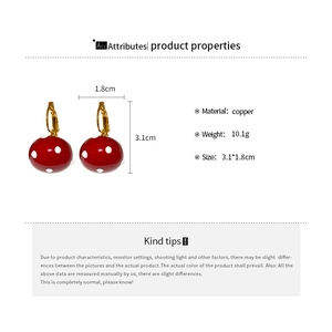 Detailed size and material specs for mushroom pearl earrings in copper with red polka dots