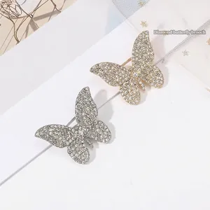 Sparkling butterfly brooch set in gold and silver finish with full crystal rhinestones