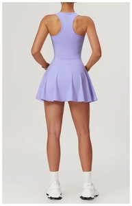 Macro detail of purple racerback sports dress with A-line pleated athletic skirt