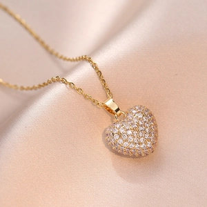 Titanium steel heart pendant necklace with pink and clear cubic zirconia on silk