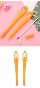 Detailed view of carrot-shaped gel pens with white bunny topper and replaceable ink refills