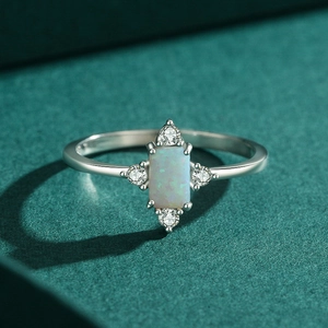 Elegant 925 sterling silver ring with rectangular blue opal and white zircon stones