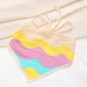 Detailed macro view of crochet wave patterns in pastel colors on cotton headband