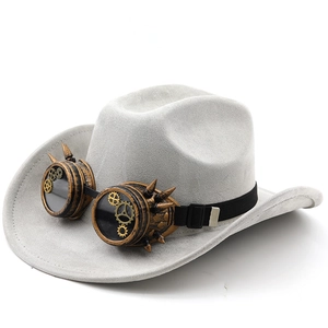 Detail of steampunk grey suede hat featuring bronze goggles with gears and metal spikes