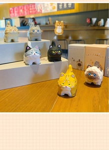 Set of six cartoon cat resin figurines with wood carving texture in CAT FAMILY packaging