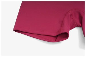 Macro shot of dark red yoga shorts featuring double-needle stitching and high-elastic knit fabric