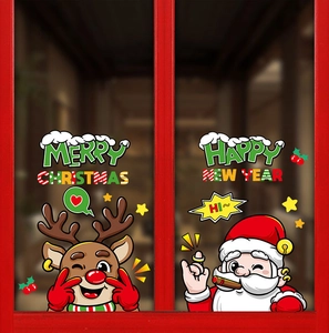 Detailed view of Merry Christmas Santa and reindeer stickers applied on a glass window