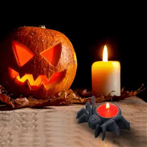 Molde silicona portavelas de araña para Halloween con fondo de calabaza iluminada