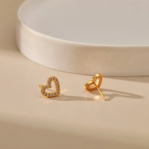 Elegant 18K gold plated heart stud earrings featuring white cubic zirconia accents