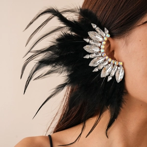 Close-up of black feather ear cuff with sparkling crystals for non-pierced ears
