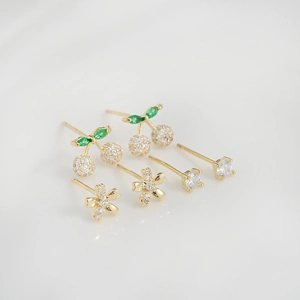 Three-pair set of S925 silver stud earrings featuring cherry, flower, and round crystal designs