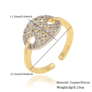 Detail view of copper ring with silver grid design, zircon inlay and product dimensions