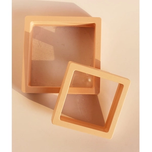 Two orange square PE film floating jewelry display boxes shown from a top-down view