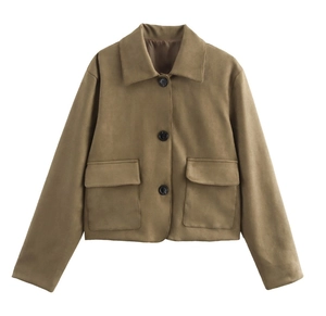Detail of a brown faux suede jacket featuring a lapel collar and large flap pockets