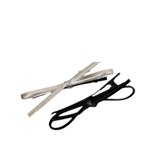 Minimalist faux leather bow hair clip set in silver and black for women's styling