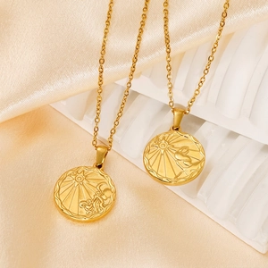 Gold stainless steel zodiac coin necklaces featuring Aquarius and Cancer sunburst pendants