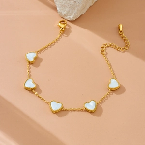 Gold-plated stainless steel chain bracelet featuring five white heart shell charms