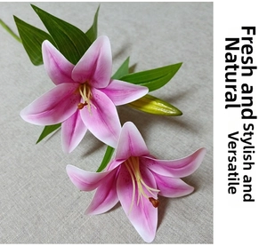 Close-up of artificial pink lily with 3D texture including two blooms and one green bud