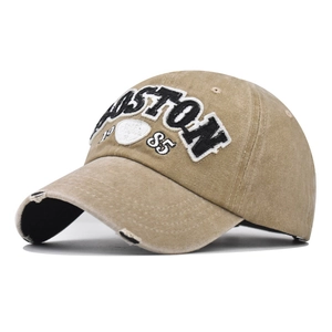 Detail of 3D Boston 1985 embroidery on distressed washed cotton vintage baseball cap