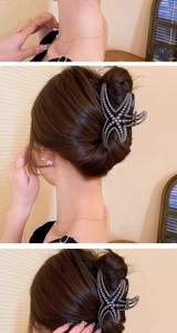 Detail showing the large starfish hair claw clip with rhinestones and pearls on hair