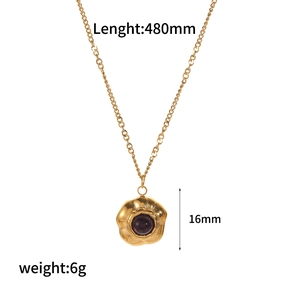 Detailed view of 18k gold rose pendant with purple gemstone and size measurements