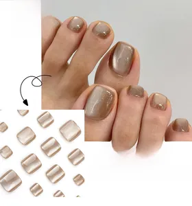 Champagne gold cat-eye press-on toenails with glitter gradient and various size options
