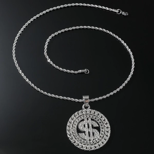 Silver iced out spinning dollar sign pendant necklace with twisted rope chain on black background