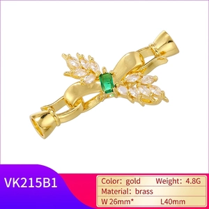 Fermoir nœud en laiton doré avec pierre verte et zircons pour la création de bijoux