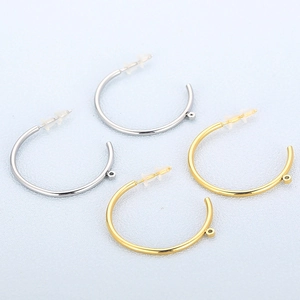 Set of C-shaped gold and silver earrings with loops and clear backs for DIY jewelry making