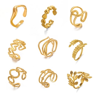 Set of 9 gold stainless steel open rings with heart, wave, and adjustable designs
