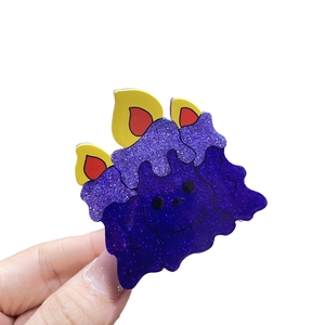 Glittery purple acrylic Halloween monster hair claw clip with colorful flame details