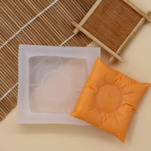 DIY pillow shaped silicone candle mold with fabric fold texture and sample finished product