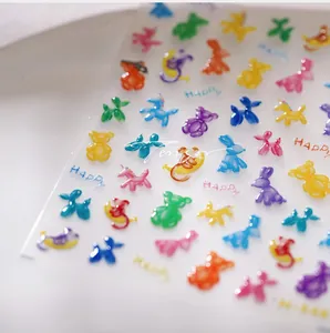 Detailed macro view of 3D embossed jelly nail stickers with colorful balloon animal patterns