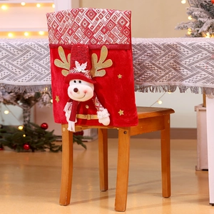 Detailed view of red Christmas chair cover with 3D reindeer doll and knit pattern