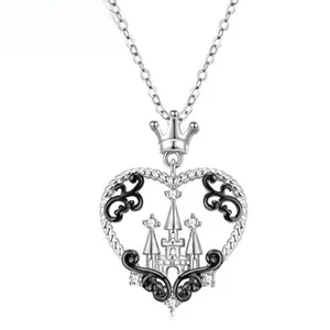 Macro detail of S925 silver heart castle pendant with black gold accents and zircons