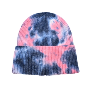 Winter tie-dye knit beanie in pink and blue-black with a classic cuffed design
