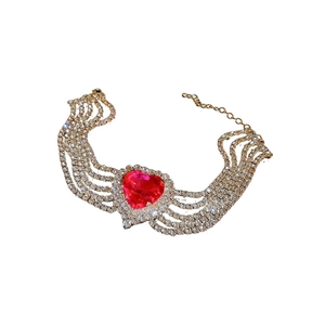 Luxurious multi-layer rhinestone choker featuring a large red heart gemstone center