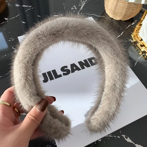 Luxurious fluffy mink fur headband in taupe grey with thick padded design for women