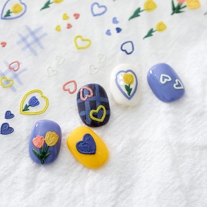 5D embossed nail stickers featuring colorful tulips and heart patterns on colorful nails