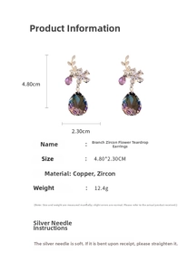 Detailed size view of branch-shaped floral drop earrings with purple zircon stones