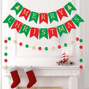 Red and green Merry Christmas swallowtail banner with round paper garlands over fireplace