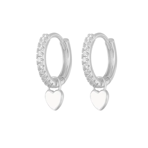 Detail of silver hoop earring with small diamonds and white heart oil drop pendant