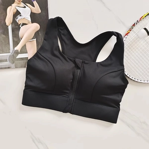 Detail of black high-impact sports bra featuring a convenient front zipper closure