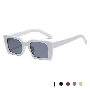 Retro square white sunglasses with dark grey lenses and wide frames for a modern fashion look