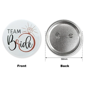 Front and back of 58mm Team Bride tinplate badge with diamond ring design for weddings
