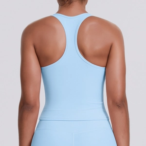 Women's light blue racerback sports vest and yoga leggings set for fitness and running