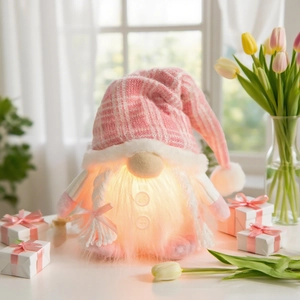 Luminous pink gnome plush with sequins and LED lights for Christmas holiday decoration
