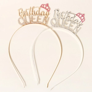 Detail of metal Birthday QUEEN headbands with pink crown and sparkling rhinestones