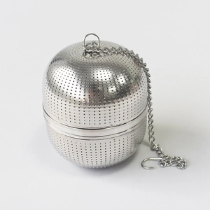 Macro detail of 304 stainless steel tea infuser ball with fine mesh and hanging chain